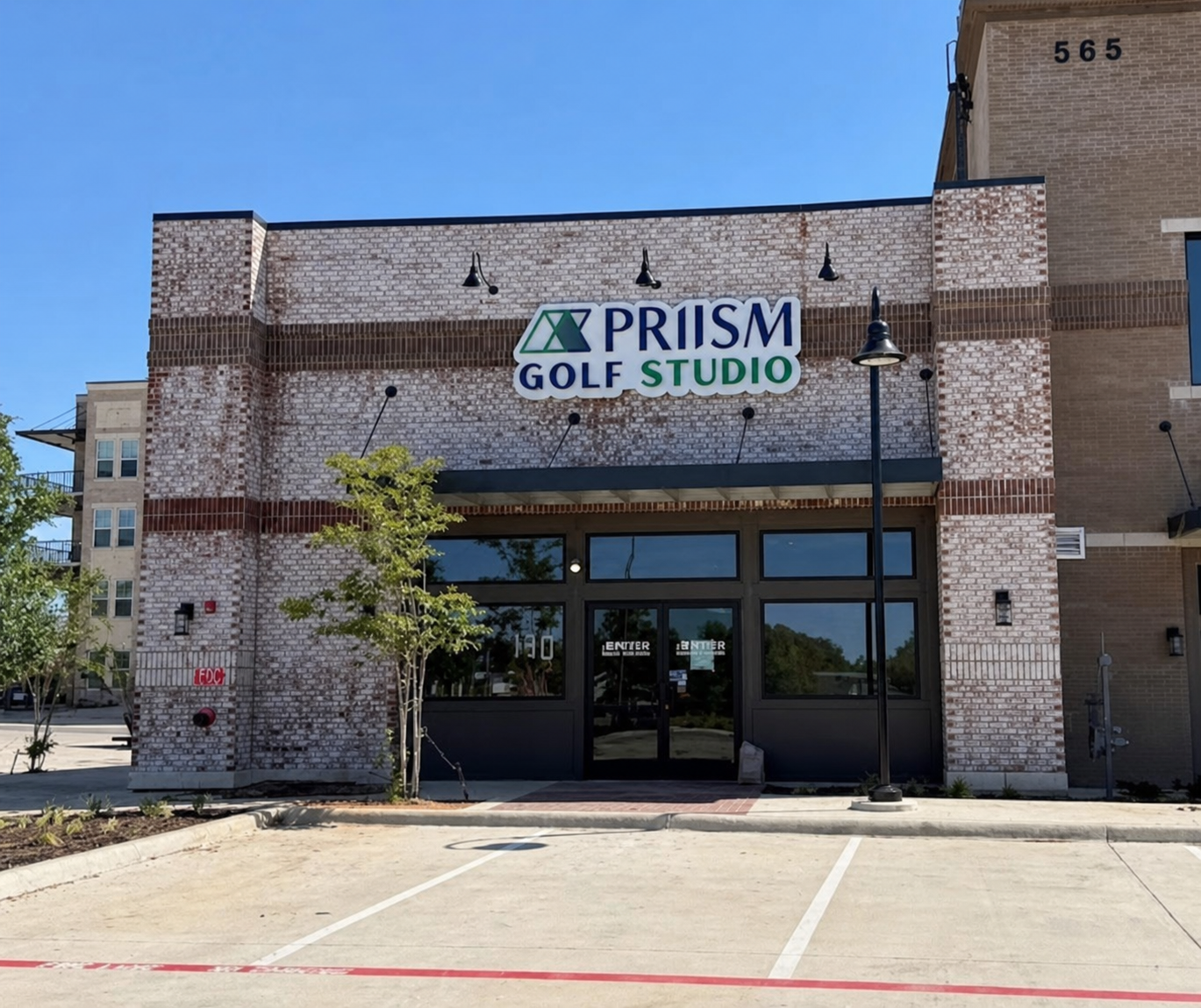 PRIISM Golf Studio entrance at 565 S Preston Rd, Suite 130, Celina, Texas